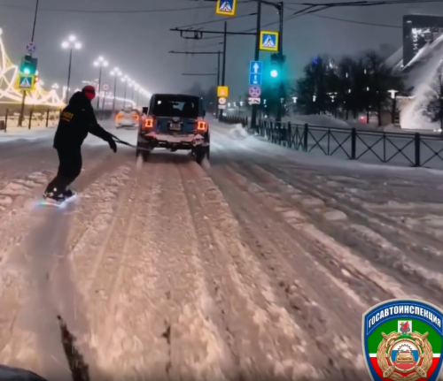 В Казани снятое на видео катание на сноуборде за «Джипом» закончилось 13 протоколами ГАИ